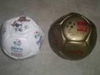 COLLECTORS FOOTBALLS - Two. Two small leather footballs:....